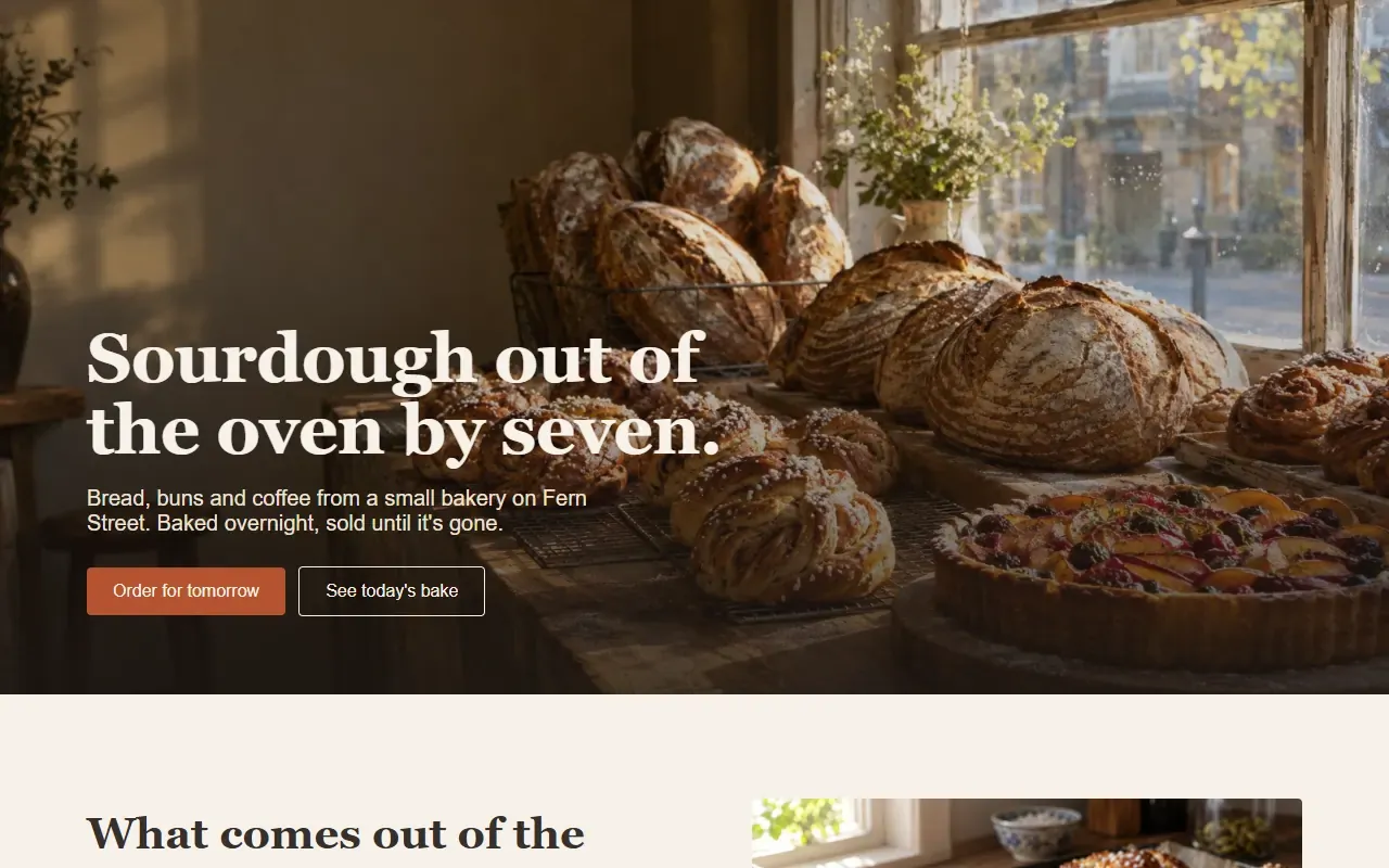 The same bakery after the fixes: a photo of loaves on the counter by a window, the headline Sourdough out of the oven by seven, and a warm rust-coloured button.